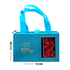 Blue gift bag with a window displaying red roses and 'LOVE' text, with measurements indicated.