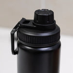 Reusable aluminium sports bottle with handle, 800 ml capacity, black and white color options for corporate gifting.