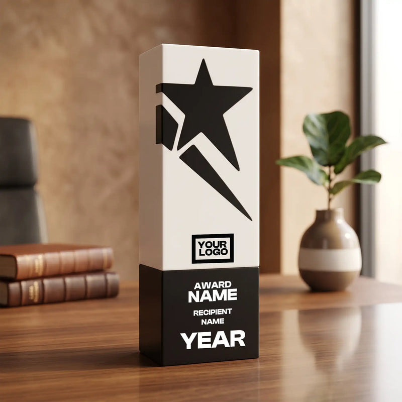 Two-tone crystal award with black star motif on white face