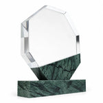 Green marble octagonal crystal award on a desk