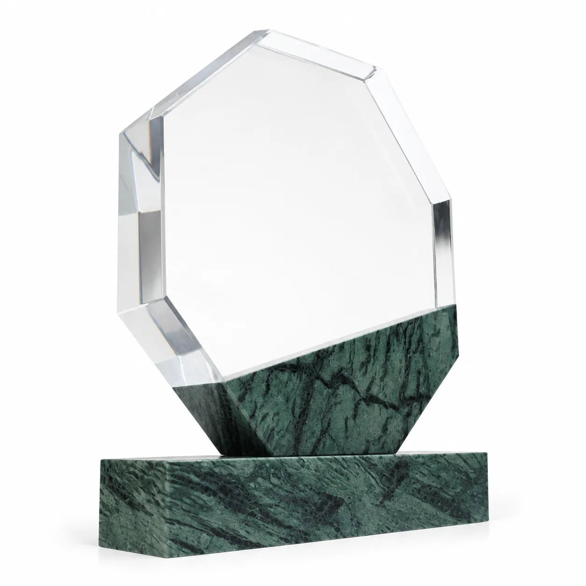 Green marble octagonal crystal award on a desk