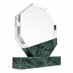 Green marble octagonal crystal award on a desk