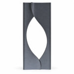 silver oval accent crystal award standing upright on a desk