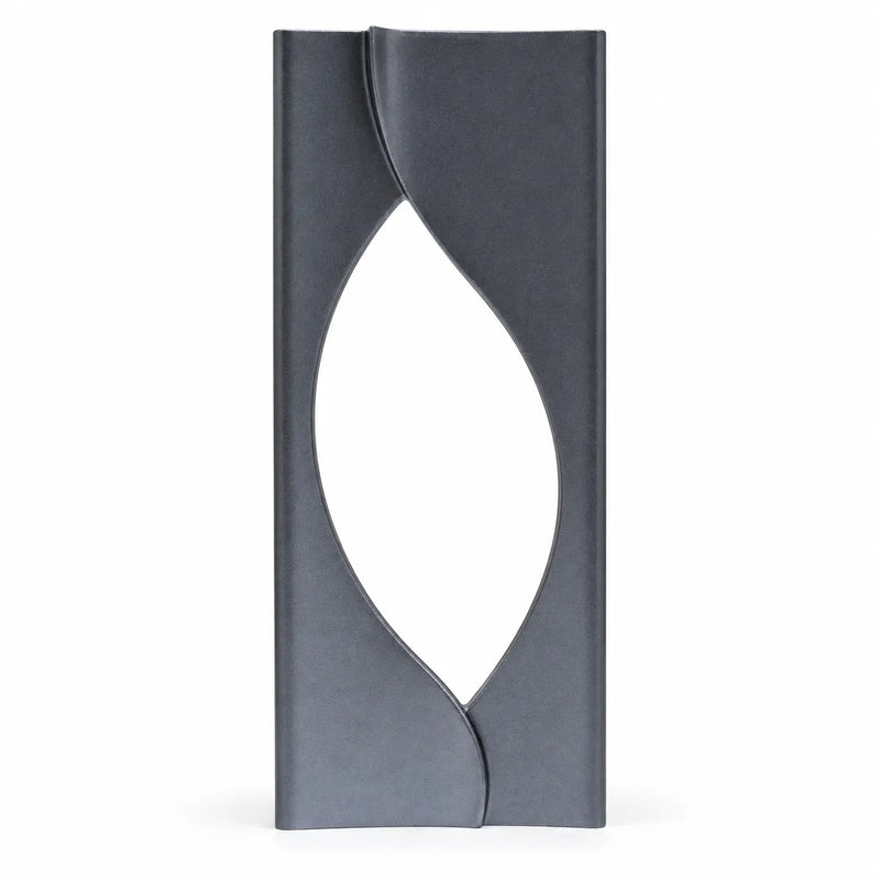 silver oval accent crystal award standing upright on a desk