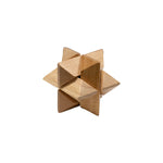 Wooden star, bead cluster, and cube puzzle set displayed beside box