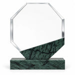 Green marble octagonal crystal award on a desk
