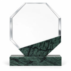 Green marble octagonal crystal award on a desk