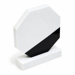 White marble octagonal crystal award on a desk
