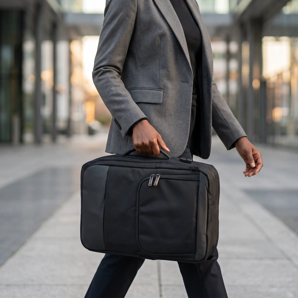 Black executive laptop backpack with USB charging port and multiple compartments