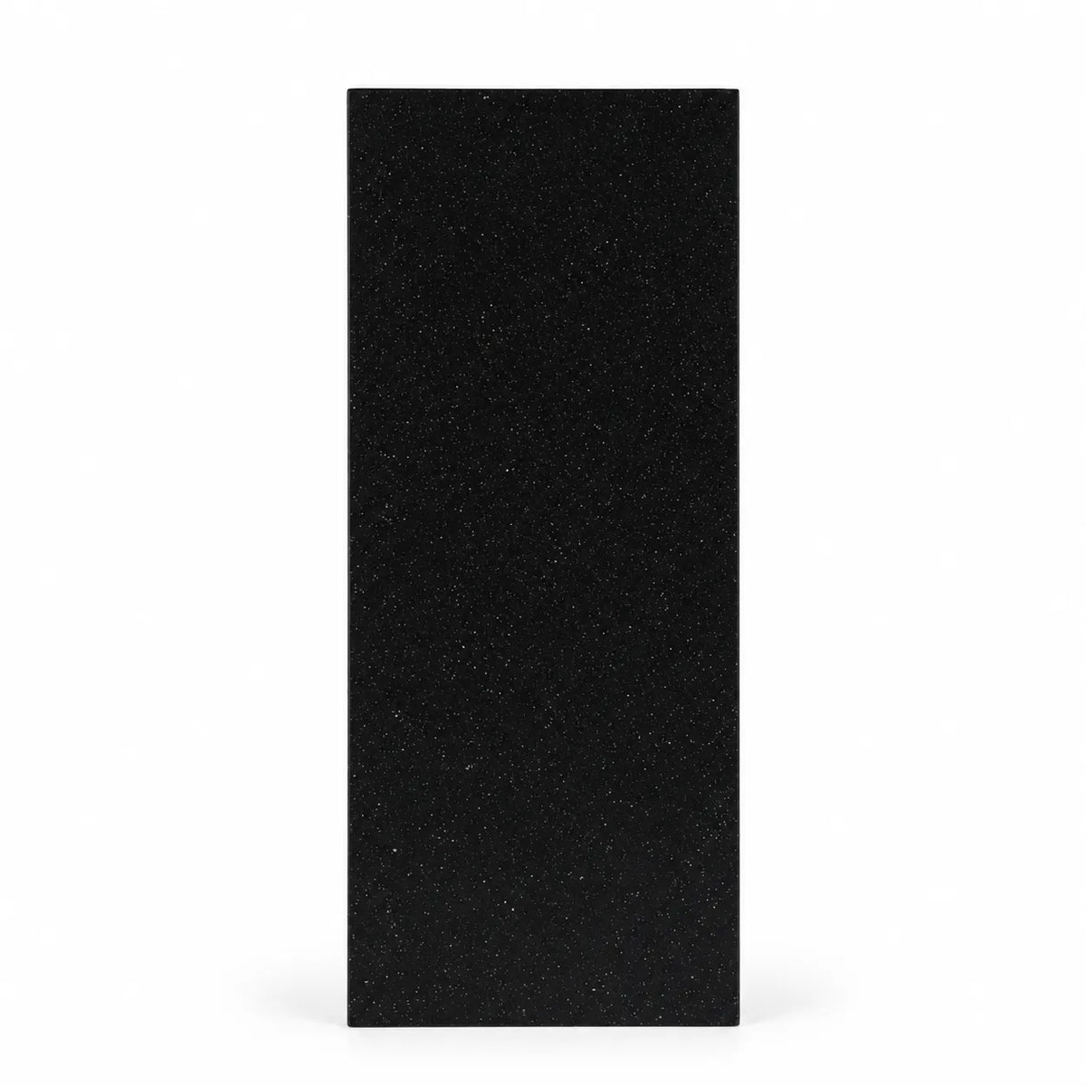 Black geometric faceted crystal award column on a desk