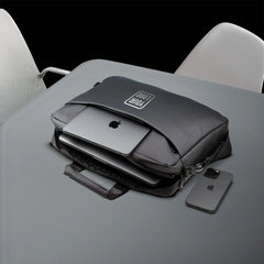 Premium black executive laptop bag with padded protection and luxury business travel design