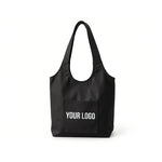 Toto canvas shoulder tote in natural with a large printed logo on the front panel