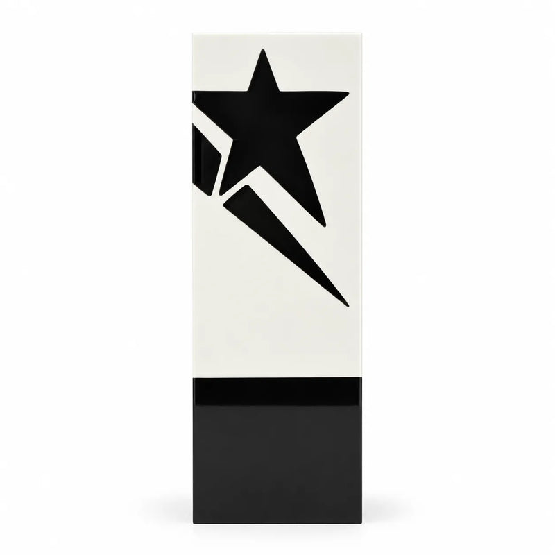 Two-tone crystal award with black star motif on white face