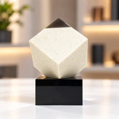 Diamond corner crystal cube on a black base on a desk