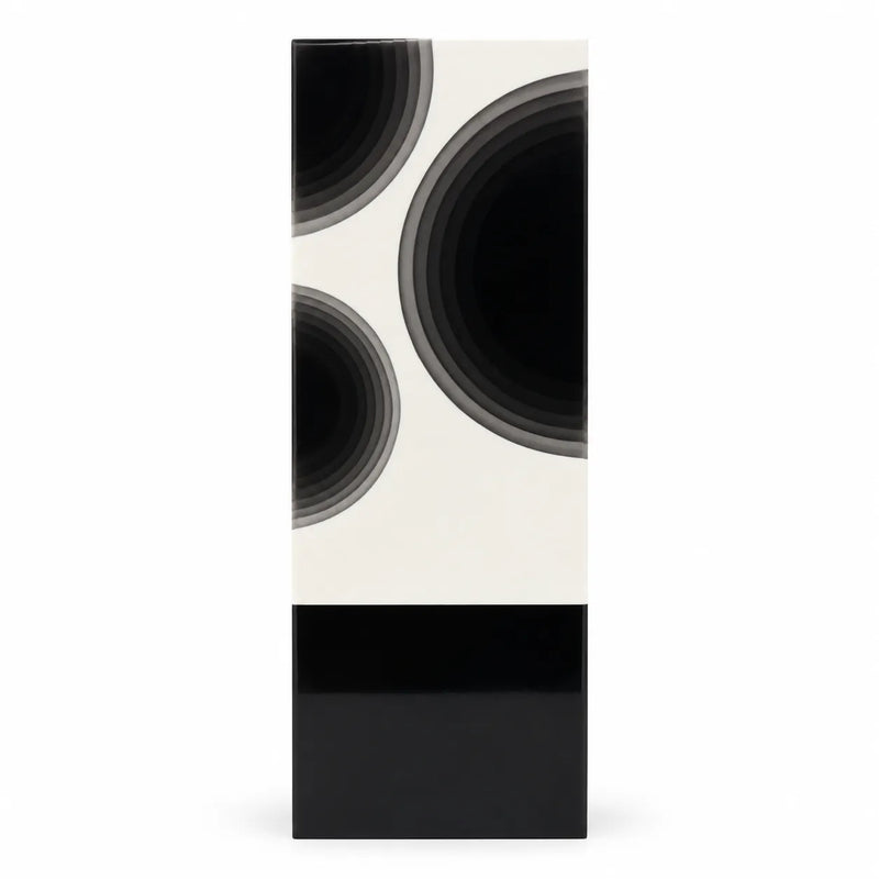 Two-tone crystal award with black orbit circle motif on white face