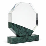 Green marble octagonal crystal award on a desk