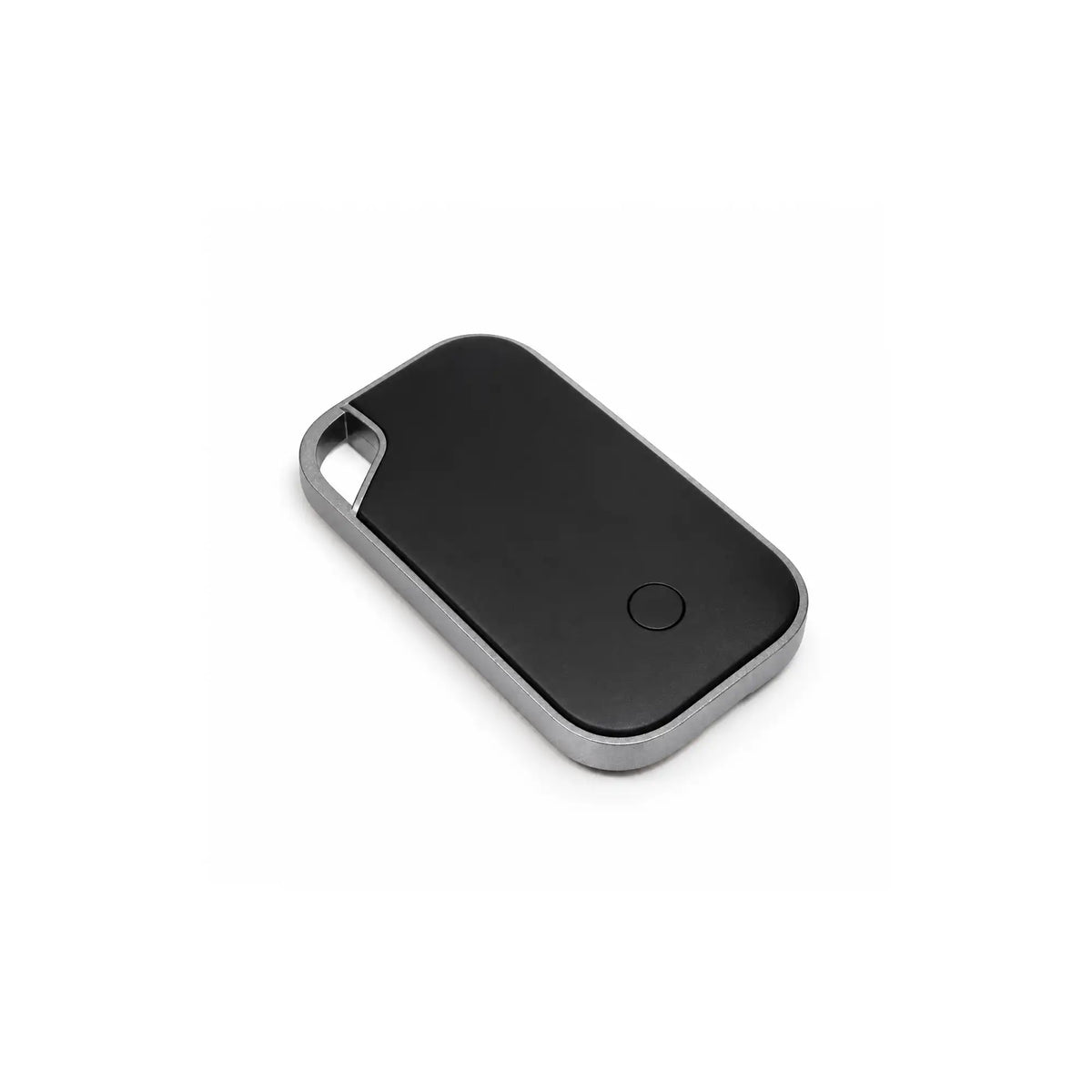 Traxo Bluetooth locator device, black panel with silver metal frame, front view