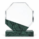 Green marble octagonal crystal award on a desk