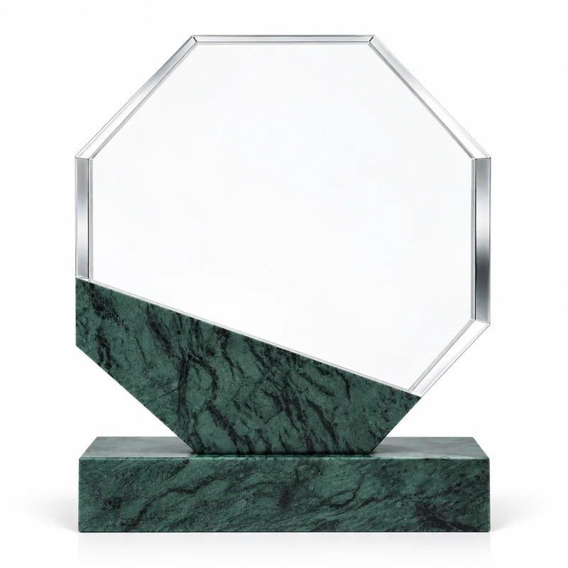 Green marble octagonal crystal award on a desk
