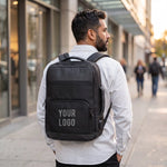 Black executive laptop backpack with USB charging port and multiple compartments