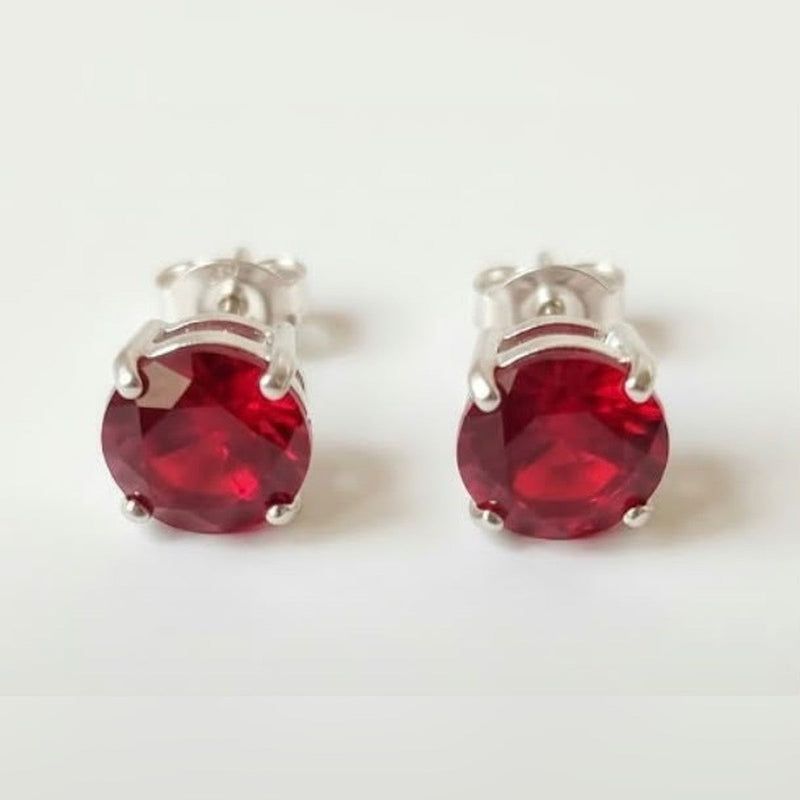 Ruby Solitaire stud earrings