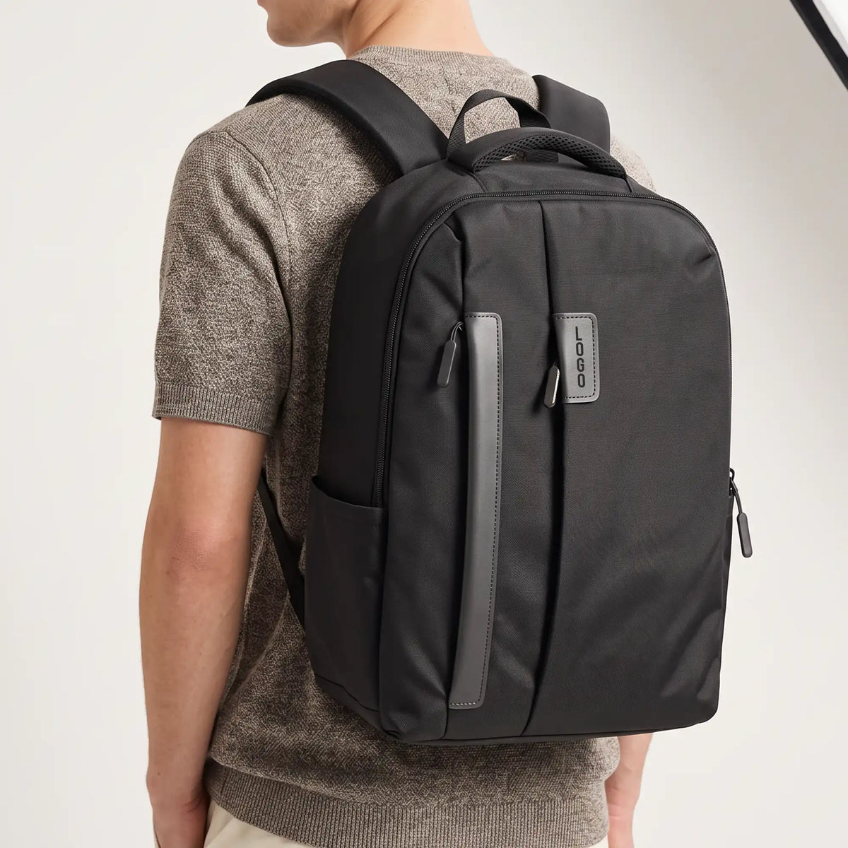Black Orvel slim business laptop backpack, front view with grey leather trim