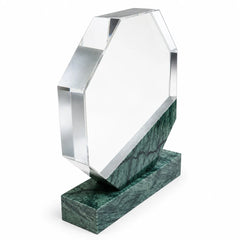 Green marble octagonal crystal award on a desk