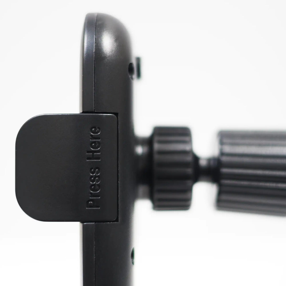 The two air vent clip attachments included with the car mobile holder