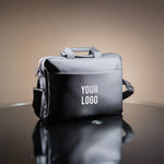 Premium black executive laptop bag with padded protection and luxury business travel design